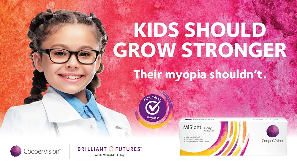 Young girl wearing glasses and doctor’s coat with MiSight contact lenses for myopia management